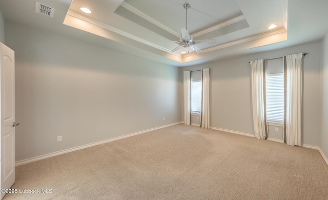 4003 124th St, Lubbock, TX 79423 - spare room with ornamental molding, a tray ceiling, plenty of natural light, ceiling fan, and light colored carpet