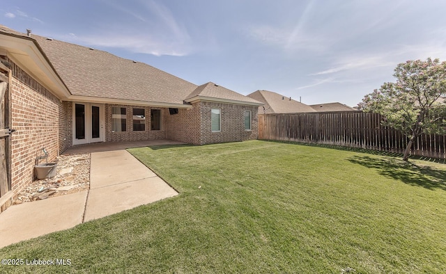 4003 124th St, Lubbock, TX 79423 - fenced backyard featuring a patio area