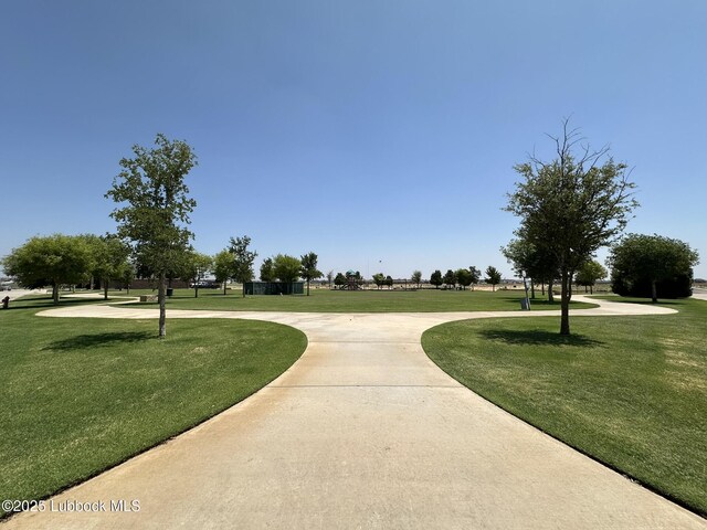 4003 124th St, Lubbock, TX 79423 - view of community with a lawn
