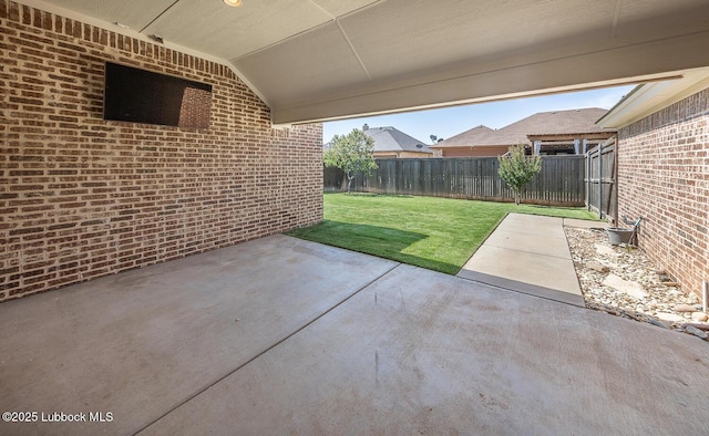 4003 124th St, Lubbock, TX 79423 - fenced backyard featuring a patio