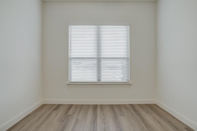 empty room with light wood-type flooring