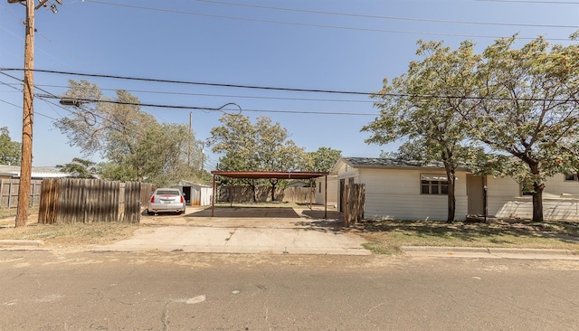 view of front of home featuring a carport