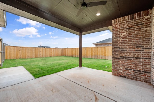 view of patio featuring ceiling fan