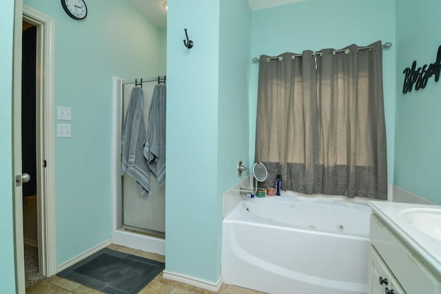 bathroom featuring vanity and separate shower and tub