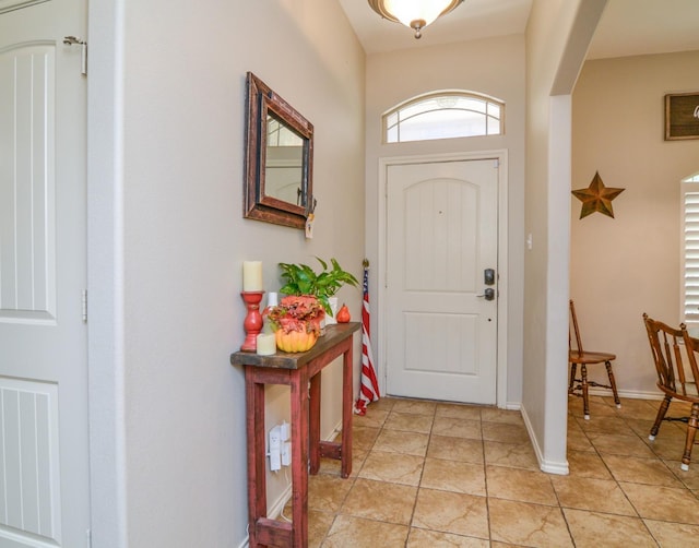 entrance foyer featuring light tile patterned floors