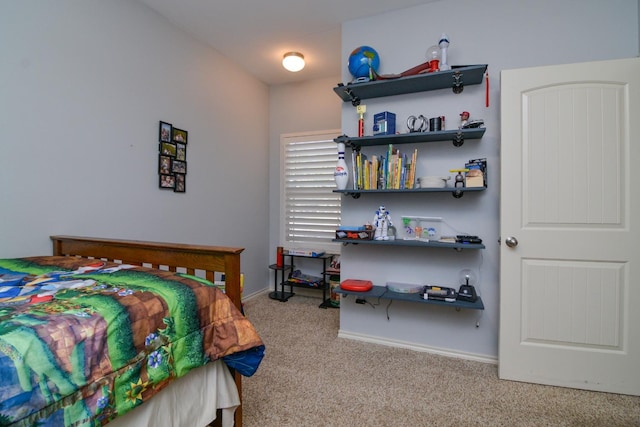 bedroom with light colored carpet