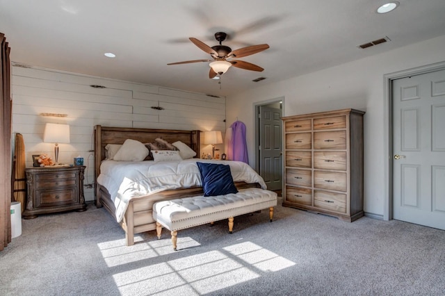 carpeted bedroom featuring ceiling fan