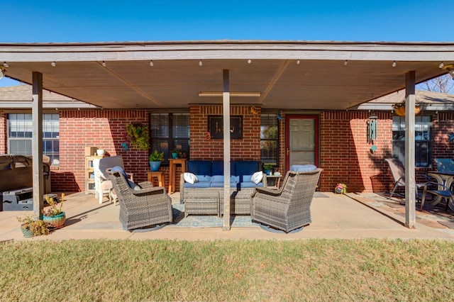 view of patio / terrace featuring grilling area, an outdoor hangout area, and ceiling fan