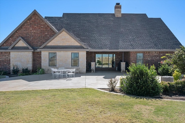 8405 E County Rd 6100, Idalou, TX 79329 - back of house with a patio, a chimney, a lawn, and roof with shingles