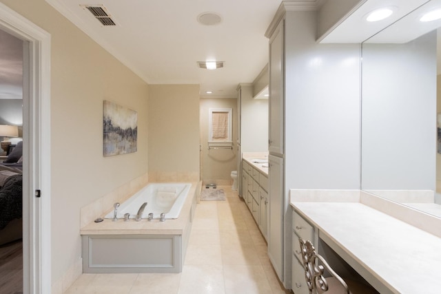 bathroom featuring a tub to relax in, tile patterned flooring, vanity, toilet, and crown molding