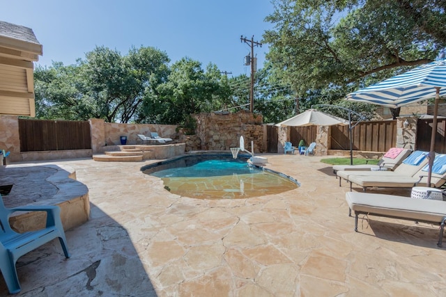 view of pool with a patio area