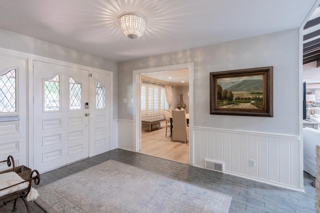 foyer featuring a healthy amount of sunlight