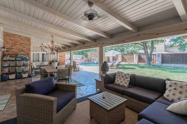 view of patio featuring outdoor lounge area and a fenced in pool