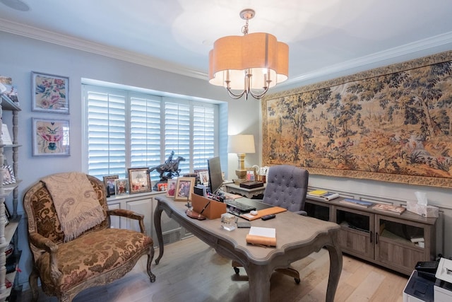 home office with ornamental molding, light hardwood / wood-style flooring, and a notable chandelier