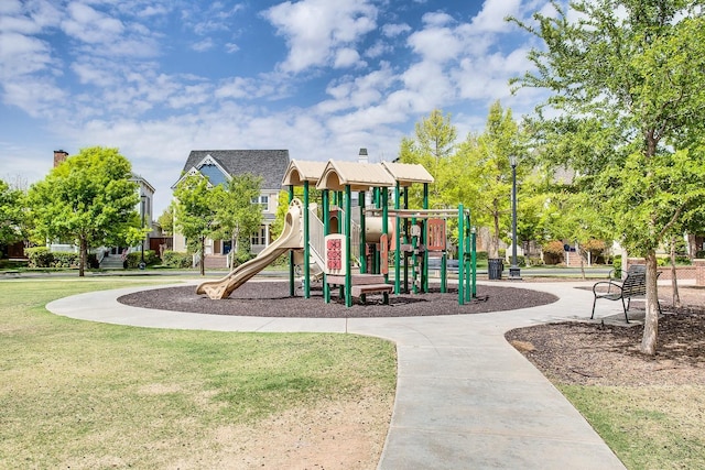 view of play area with a yard