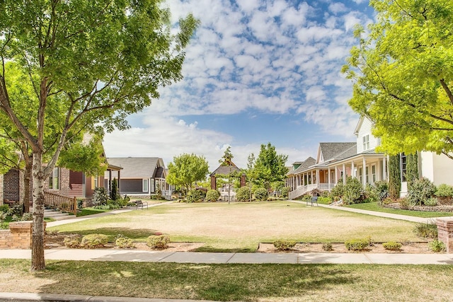 view of community featuring a lawn