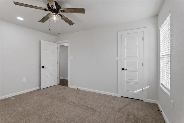 unfurnished bedroom with carpet floors, ceiling fan, baseboards, and recessed lighting