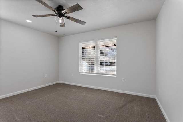 carpeted empty room featuring recessed lighting, ceiling fan, and baseboards