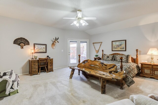 bedroom with light carpet, access to outside, ceiling fan, and vaulted ceiling