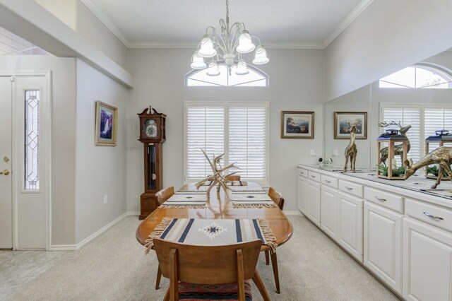 dining area featuring crown molding, light carpet, and a notable chandelier