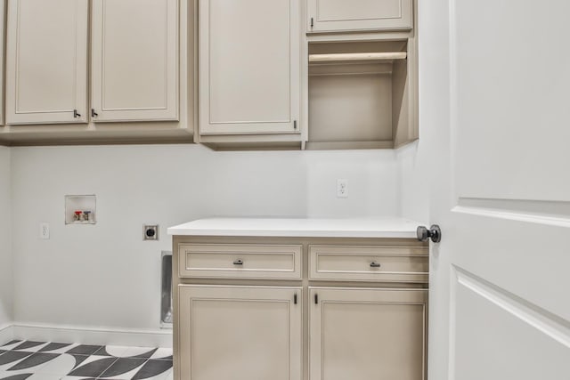 clothes washing area featuring washer hookup, cabinets, and hookup for an electric dryer