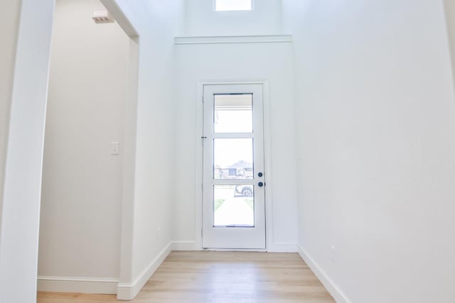 entryway with light hardwood / wood-style flooring