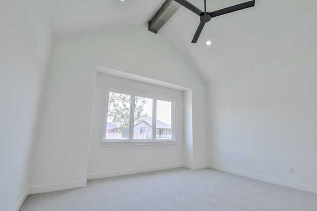 unfurnished room featuring light carpet, ceiling fan, high vaulted ceiling, and beamed ceiling