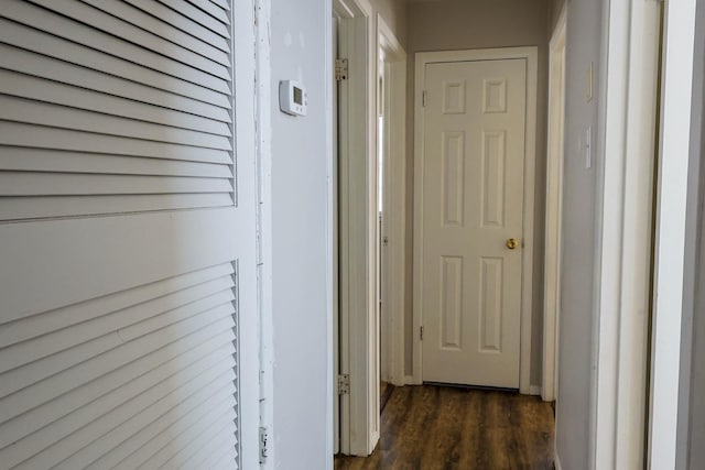 hallway featuring dark hardwood / wood-style floors