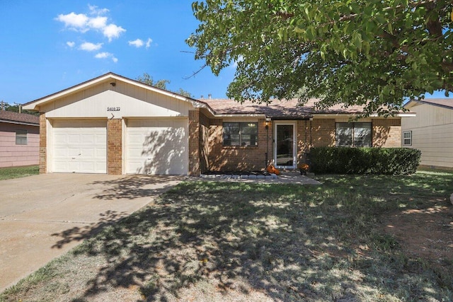 5408 22nd St, Lubbock, TX 79407 - single story home featuring brick siding, concrete driveway, a garage, and a front lawn
