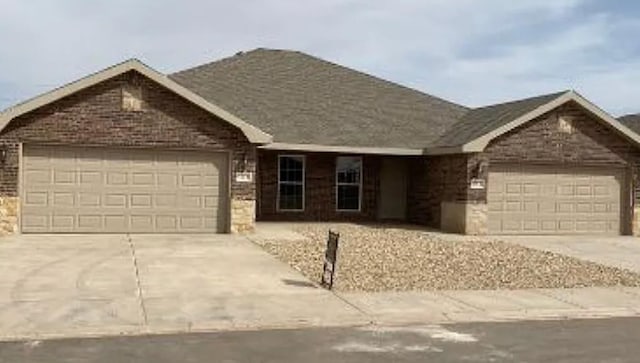 ranch-style home with a garage