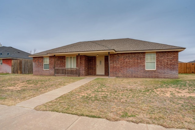 ranch-style house with a front lawn