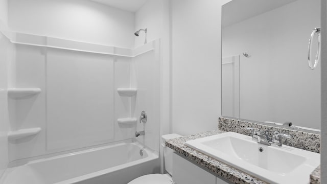full bathroom with toilet, vanity, and shower / bath combination