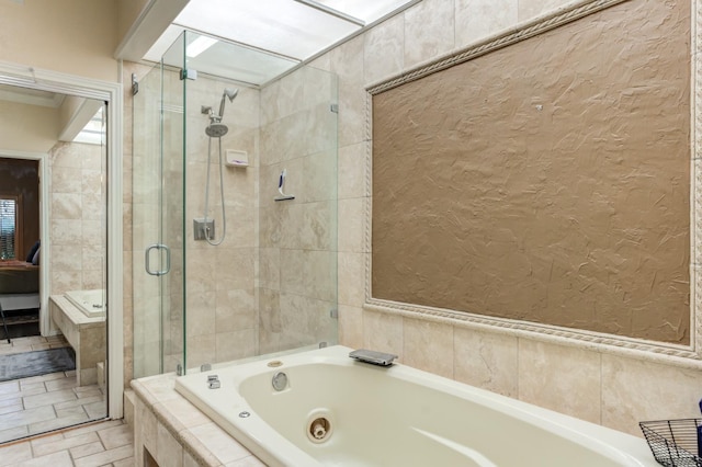 bathroom with shower with separate bathtub