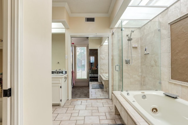 bathroom with tile patterned flooring, vanity, crown molding, and plus walk in shower