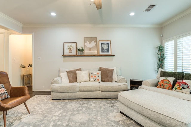 living room featuring hardwood / wood-style floors and ornamental molding