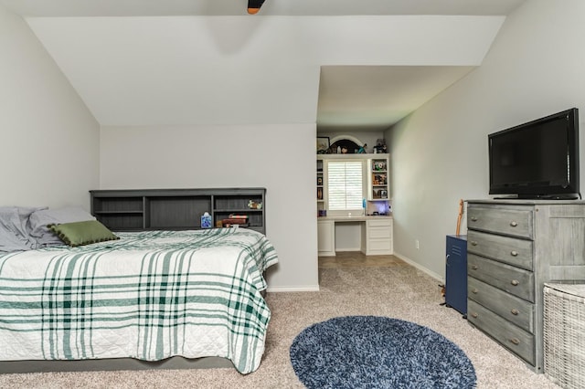 bedroom featuring lofted ceiling, light carpet, and ceiling fan