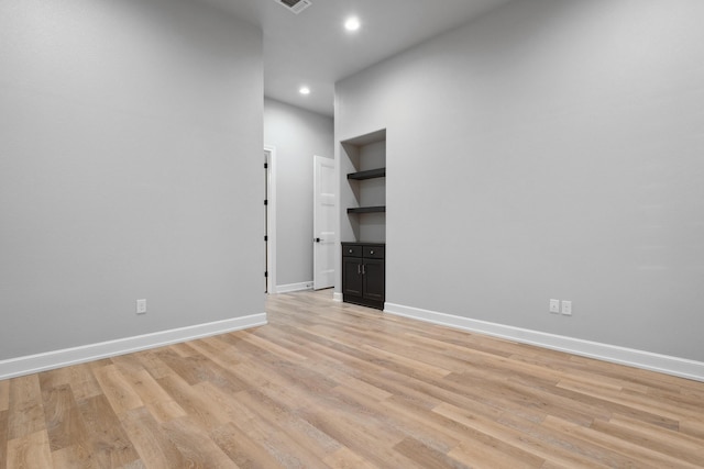 unfurnished room featuring light wood-type flooring