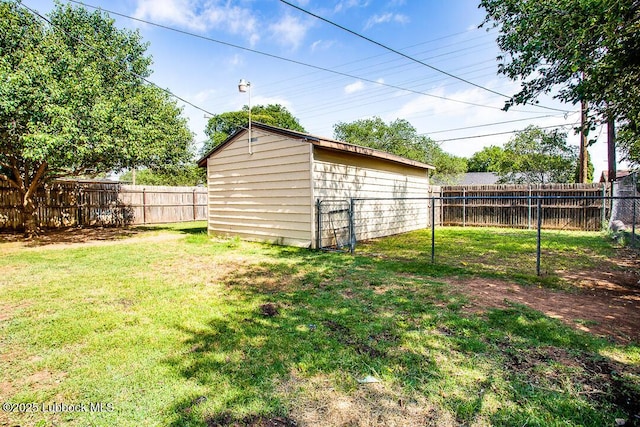 504 53rd St, Lubbock, TX 79404 - fenced backyard featuring a storage unit