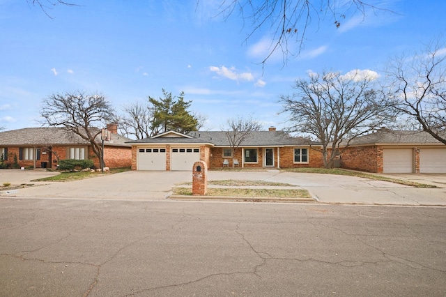 single story home featuring a garage