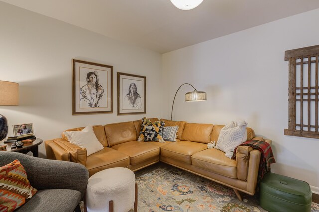 misc room with hardwood / wood-style floors and a fireplace