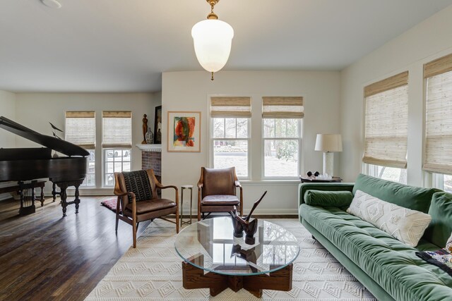 bedroom with ceiling fan and dark hardwood / wood-style flooring