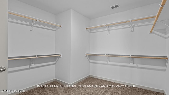 426 14th St, Wolfforth, TX 79382 - spacious closet featuring carpet floors