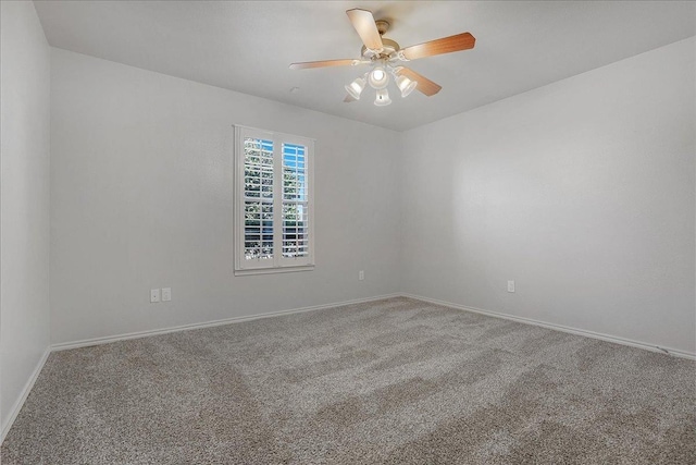 empty room with carpet floors and ceiling fan