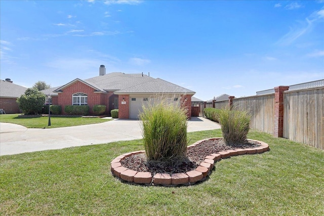 single story home featuring a garage and a front lawn