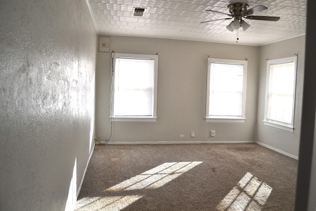 carpeted empty room with ceiling fan