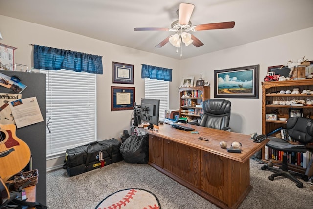 office space with carpet floors and ceiling fan