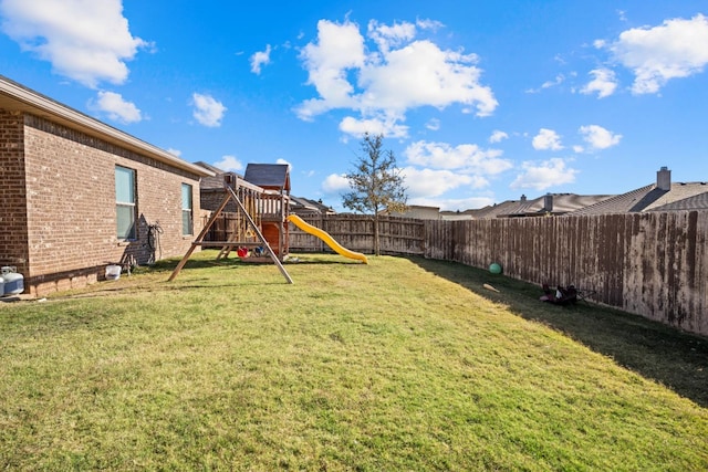 view of yard featuring a playground