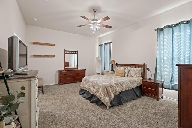 bedroom featuring ceiling fan and carpet floors