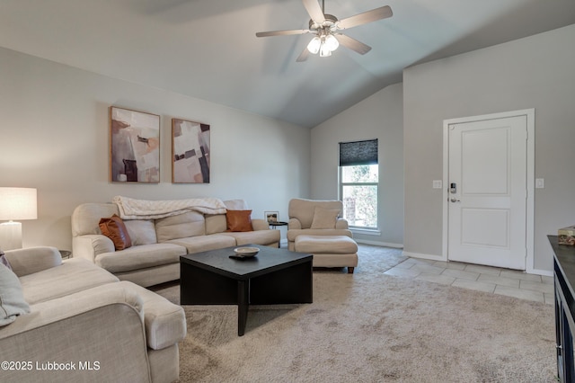 7511 31st St, Lubbock, TX 79407 - tiled living room with vaulted ceiling, a ceiling fan, and carpet flooring