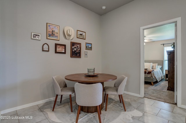 7511 31st St, Lubbock, TX 79407 - dining space with baseboards and light tile patterned floors